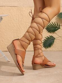 Sandalias de mujer estilo romano con lazo en el dedo, tacón de cuña, tiras cruzadas y diseño calado, nuevas para el verano 2024, moda europea y americana - Caqui - Ver 6