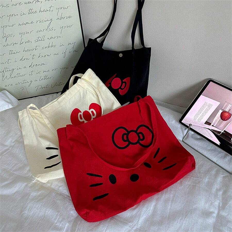 SANRIO حقيبة قماشية بطبعة قطة كرتونية لطيفة، حقيبة كتف نسائية بسعة كبيرة وكاجوال، حقيبة توت عصرية متعددة الاستخدامات - مشاهدة 1
