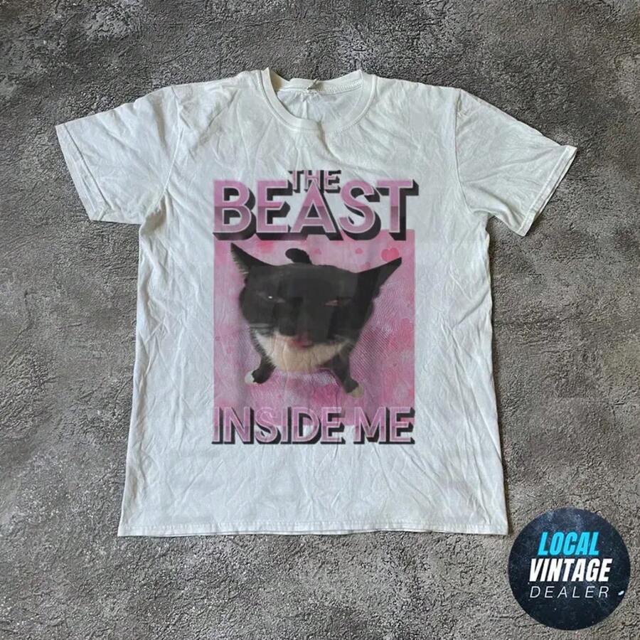 T-shirt con stampa oversize, t-shirt vintage retrò, t-shirt Mondiale 2026, t-shirt estetica Y2K, La bestia dentro di me t-shirt, t-shirt divertente con volto di gatto, t-shirt con motivo retrò Y2K anni '90, t-shirt satirica - 1 - Visualizzare 1