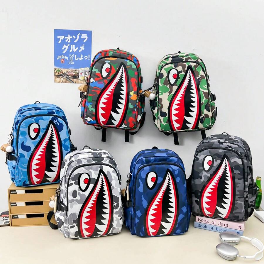 熱銷 6 色時尚個性酷鯊魚印花大容量多口袋尼龍後背包，大學風校園包，多功能背包，附 USB 充電孔，可收納手機、平板、書籍、文具、文件、衣物、折疊傘、水壺等，適合國中、高中、大學生，開學季必備旅行背包，假期出遊必備，開學禮物，送給男士、男友的禮物，情人節、聖誕節適用