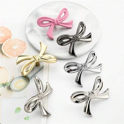 1 pieza Tirador de gabinete y cajón de metal con forma de lazo - Elegante tirador decorativo con forma de mariposa vintage, adecuado para tocador, armario, zapatero y estantería, herrajes para gabinete de cocina del hogar (1 tornillo + 1 tirador)