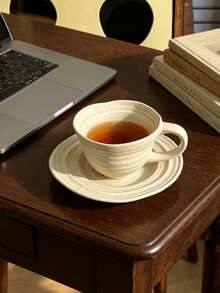 1set Vintage Sesame Matte Cup And Saucer, Wabi-Sabi Style With Rich Texture, Distressed Craftsmanship Creates A Relaxed Atmosphere. Asymmetric Shape Paired With 3D Ribbed Design, Unique And Niche. Thick And Durable Ceramic Material, Matte Frosted Texture With Delicate Touch, Suitable For Restaurant And Home. Perfect For Coffee And Tea Drinking, Unique Aesthetic And Practical, Great For Photography. - Multicolor - View 3