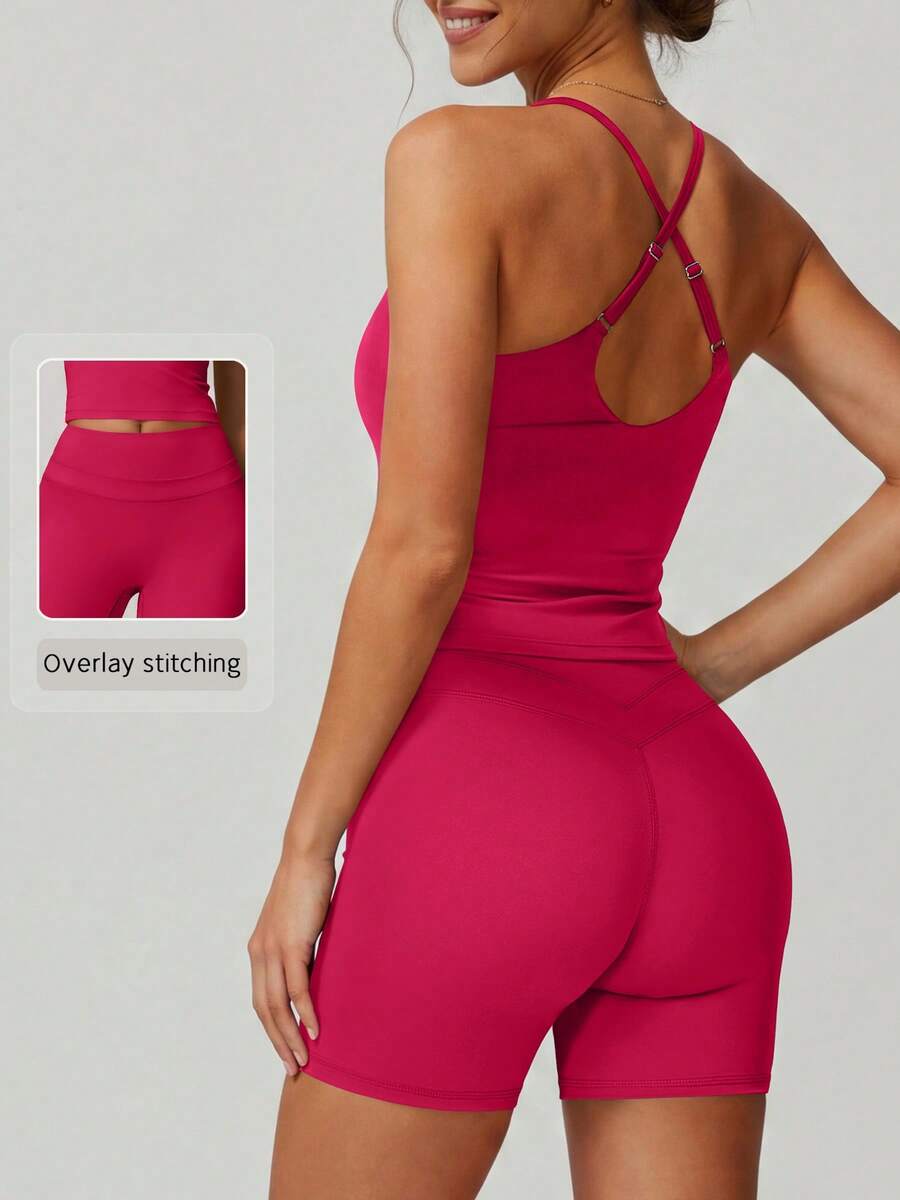 NcmRyu Setelan Olahraga Wanita Satu Set Warna Polos, Kerah U, Bantalan, dan Celana Pendek Ketat dengan Detail Silang di Belakang - Hot Pink - View 1