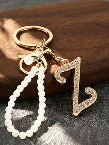 高級優雅金色鑽石字母鑰匙圈，珍珠鑲嵌，A-Z 3D字母吊墜，搭配優雅珍珠鏈（可根據個人喜好拆卸），時尚合金鑰匙環，可用作包包、背包吊飾或汽車鑰匙圈。經典極簡，裝飾品與包包配件，教師節禮物、姊妹禮物、最佳教師禮物、生日禮物、週年紀念禮物、畢業禮物、創意禮物、返校季禮物 - 彩色 - 查看 24