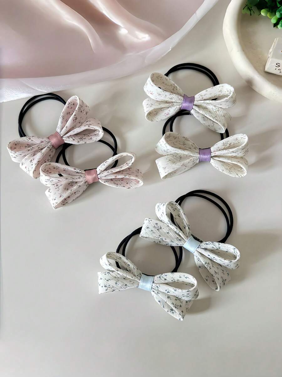 2入花卉印花蝴蝶結髮圈，小花圖案布藝蝴蝶結彈性馬尾髮帶，甜美女孩日常髮飾