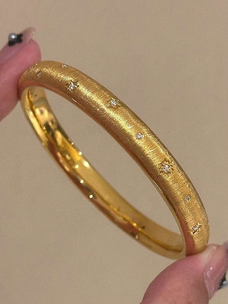 1 pieza Pulsera de cielo estrellado, incrustada con rhinestones chapados en oro, pulsera de lujo elegante y versátil
