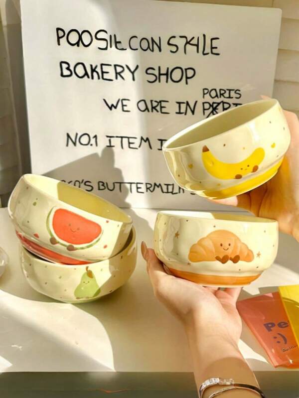 1pc Highly Attractive Ceramic Bowl, Cute Fruit & Croissant Pattern, Lively And Adorable, Novel And Eye-Catching Style. Medium Size For Personal Use, Versatile For Rice, Yogurt, Desserts. Smooth And Fine Porcelain, Easy To Clean And Durable, Suitable For Daily Meals And Afternoon Tea, Combines Aesthetics And Practicality, Perfect For Home Use.
