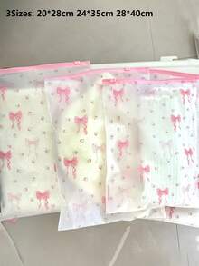 10個透明印花蝴蝶結拉鍊衣物收納袋 - 由耐用PEVA材質製成，適用於存放衣物、內衣、盥洗用品和化妝品。商務出差、旅行、居家整理和行李分類的必備品，高品質。 - 彩色 - 查看 5