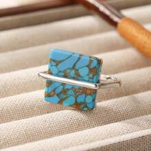 Este anillo irradia un estilo artístico natural, con un diseño minimalista pero impactante que es discreto pero lleno de presencia. Es adecuado para usar en una variedad de ocasiones como fiestas temáticas y campamentos al aire libre. - Plateado - Ver 3