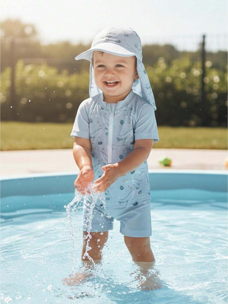 Trajes de baño Rash Guard para niños pequeños, camisetas de manga corta con estampado de dinosaurios, pantalones cortos, sombrero, conjuntos de baño de tres piezas - Azul - Ver 1