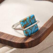 Este anillo irradia un estilo artístico natural, con un diseño minimalista pero impactante que es discreto pero lleno de presencia. Es adecuado para usar en una variedad de ocasiones como fiestas temáticas y campamentos al aire libre. - Plateado - Ver 6