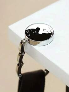 1 pieza Gancho con patrón de dibujos animados, estampado de gato blanco y negro, plegable, adecuado para mesa, escritorio, puede colgar bolsas - Blanco y Negro - Ver 2