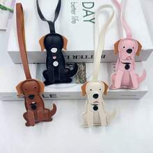 拉布拉多犬與比熊犬包包掛飾，由PU皮革與編織繩製成。適用於包包、汽車、手機與錢包裝飾。精緻配件，適合各種節日禮物。 - A - 查看 10