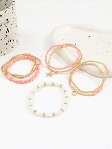 Set de 8 pulseras de cuentas de estilo bohemio con colgantes de estrella de mar y concha de cuentas de semilla rosa, pulseras de cuentas apilables de múltiples capas con cristal falso CCB para mujeres - Dorado - Ver 5