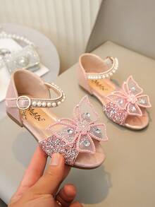 Vielseitige Prinzessinnen-Sandalen für Kinder mittlerer bis großer Größe, weiche Sohle, komfortables Design, verziert mit Strass-Schleife und Perlenanhänger, geeignet für Einkaufszentrum und Lässig aktivitäten - Pink - Übersicht 1