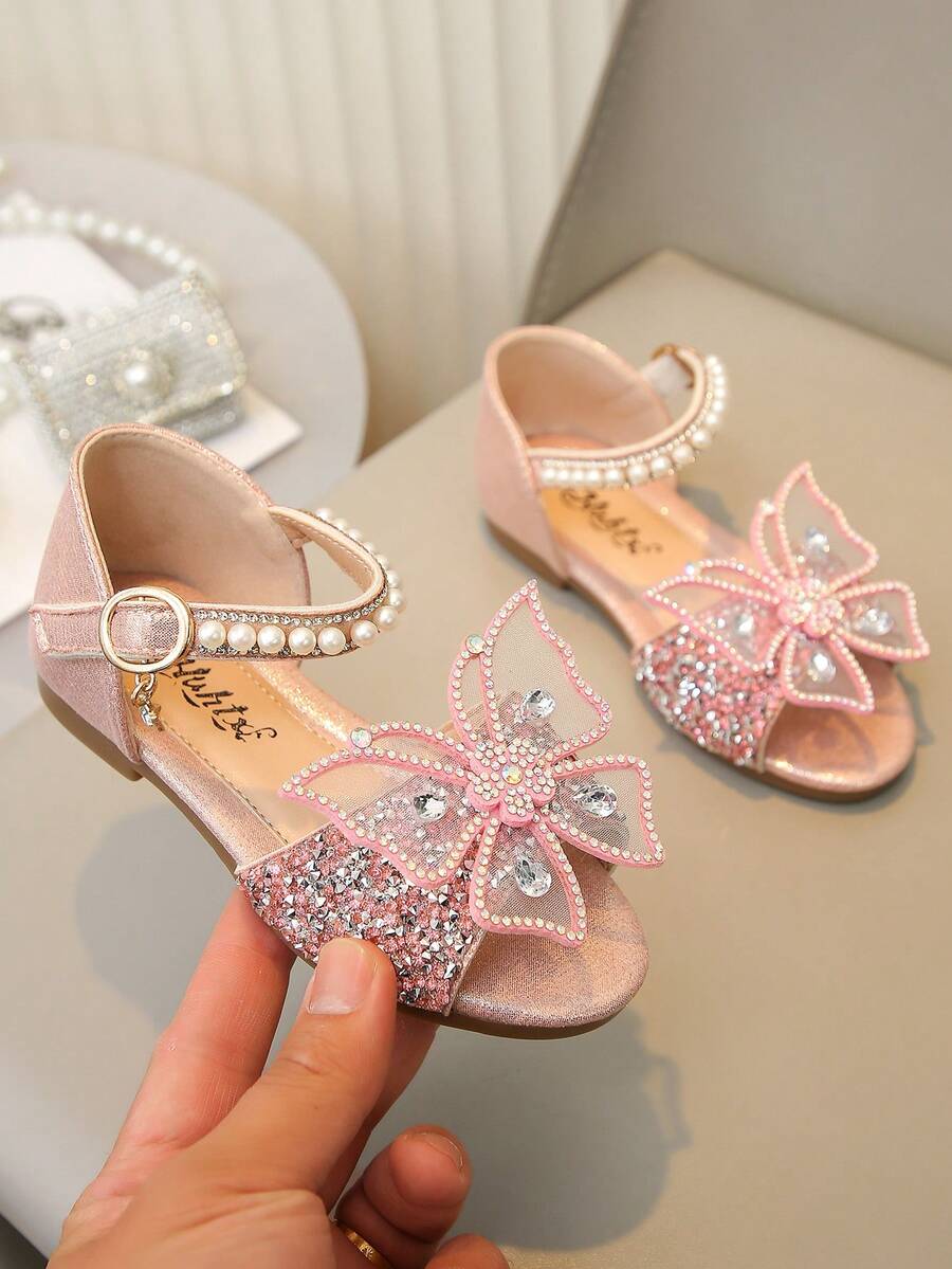 Vielseitige Prinzessinnen-Sandalen für Kinder mittlerer bis großer Größe, weiche Sohle, komfortables Design, verziert mit Strass-Schleife und Perlenanhänger, geeignet für Einkaufszentrum und Lässig aktivitäten - Pink - Übersicht 1