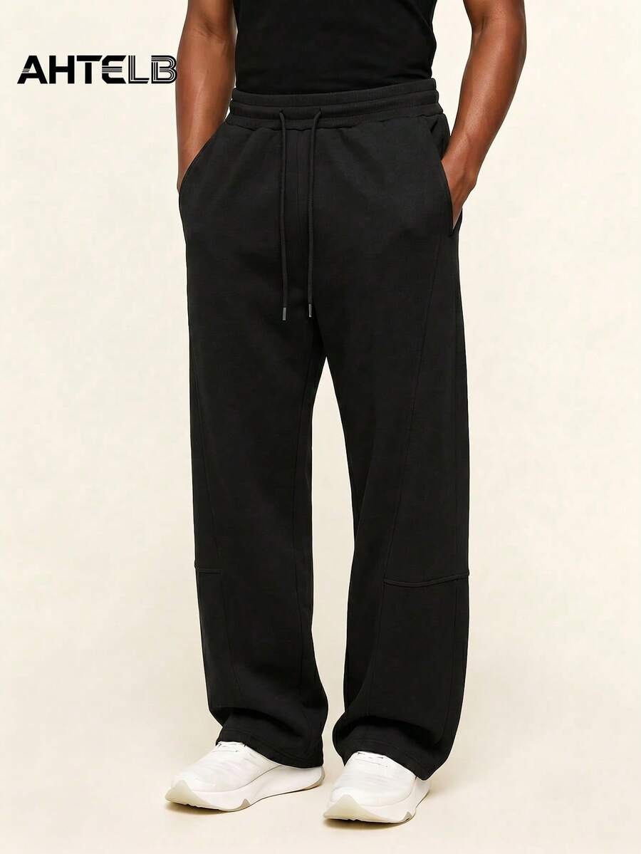 AHTELB Men's All-Season Drawstring Elastic Waist Casual Wide Leg Pants, Comfortable Fashionable Versatile Solid Color Straight Leg Trousers, Street Style Sports Casual Pants, Loose Drape Straight Leg Sweatpants, Suitable For Daily Commute, Casual Wear And Outdoor Running, Men's Clothing, Men's Pants, Men's Sportswear, Men's Gym Wear, Men's Sweatpants, For Friends, Husband, Boyfriend Gifts - Black - View 1