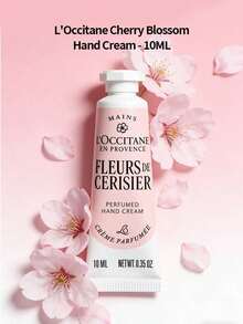 L'Occitane كريم يدين بزهر الكرز من لوكسيتان بحجم 10 مل محمول - كريم يدين فاخر مرطب، كريم مغذي زهري، مصمم خصيصاً لليدين الجافة والمتشققة، محمول للسفر، هدية راقية للصديقة والأم، عناية يومية أساسية لليدين، إكسسوار عناية بالبشرة فاخر، عطر زهري أنيق، مناسب للعمل والتنقل والاستخدام اليومي - رائحة زهر الكرز - مشاهدة 1