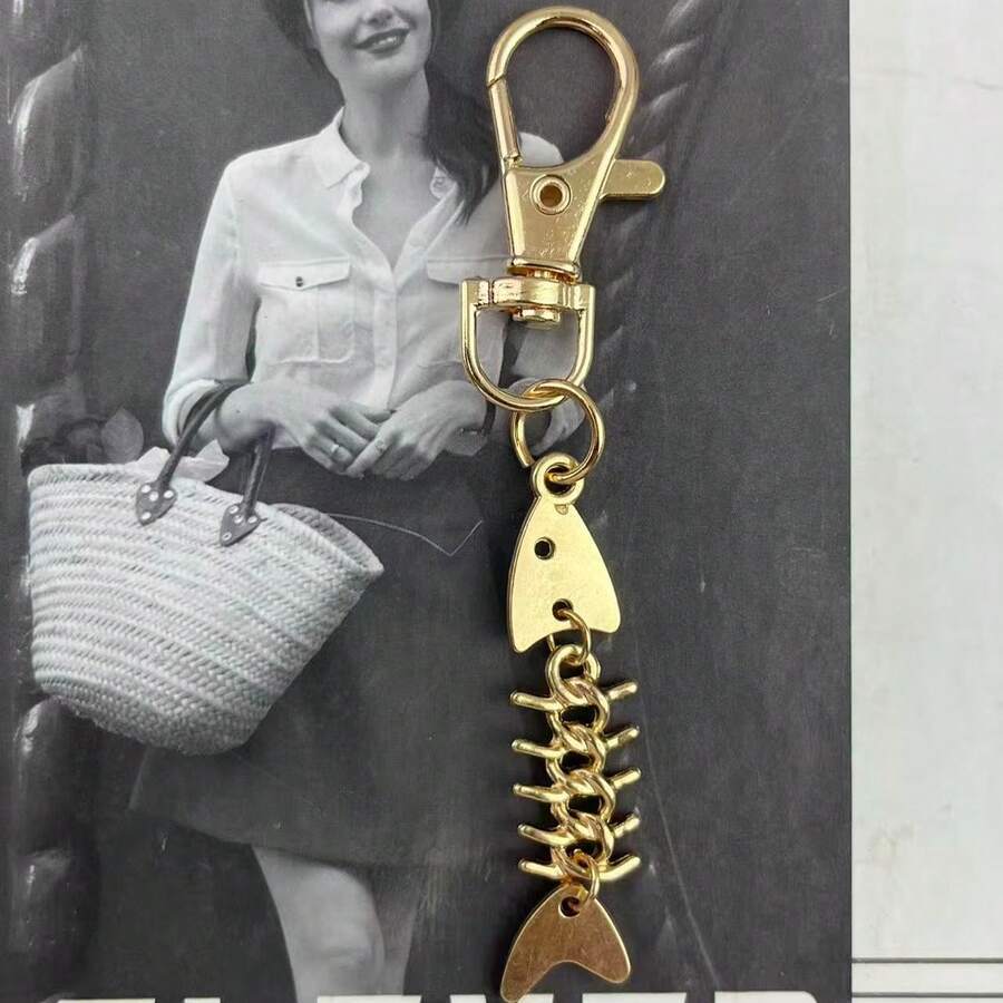 1 pieza Llavero minimalista personalizado con diseño realista de hueso de pescado, llavero casual de unicolor con mini aleta de pez/hueso de pez de color aleatorio, modelo de abridor de botellas, colgante versátil para bolsos, teléfonos y llaves - Dorado - Ver 1