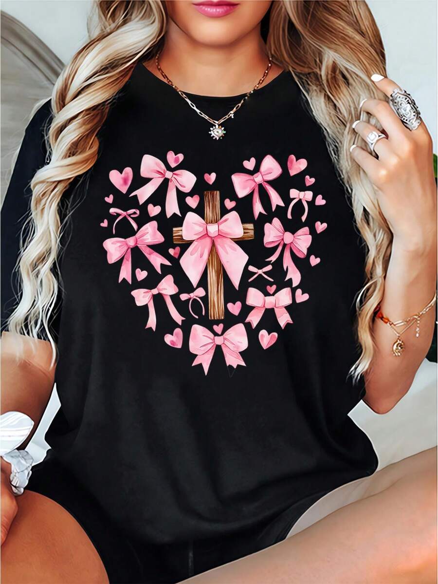 A Valentine'S Day Pink Bow Printed Round Neck T-Shirt, Cross Print Short-Sleeved T-Shirt, Four Seasons Can Wear Women'S Top, Valentine'S Day Gift Tee For Adult, Men, Women, Teen, Teenager, Adolescent, Youth - Black - View 1