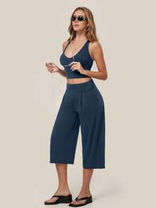 TimeOff Women's One Set Solid Color Built-In Padded Cropped Tank Top With Side Pockets And Pleated Waist Wide Leg Mid-Length Pants Sports Set - Blue - View 4