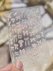 1片溫柔奶白色波點蝴蝶結美甲貼紙，5D 3D 浮雕貝殼亮面質感，甜美女孩風 Ins 風美甲貼，超薄防水自黏，適合法式紅邊白邊美甲，百搭芭蕾風溫柔指尖裝飾，新手 DIY 易上手，打造清甜優雅風美甲，內含細閃亮片效果，讓指尖擁有柔光氛圍，春季溫柔風美甲必備貼紙 - 彩色 - 查看 2