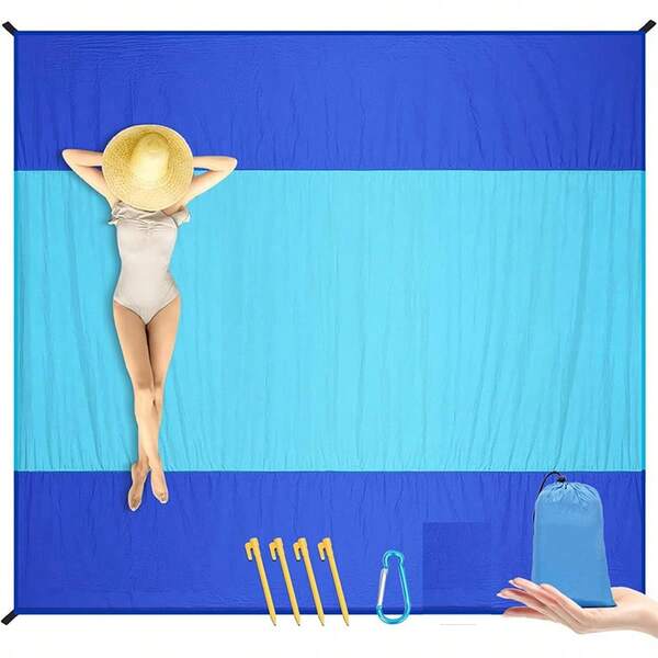 A Large Picnic Blanket (Suitable For 4–6 People) And Beach Mat, Complete With Stakes. This Picnic Blanket Is Perfect For Camping, Music Festivals, Sporting Events, And Other Activities. It Is Sand-Resistant, Extra-Large, Compact, And Lightweigh