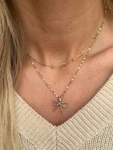 1 pieza Collar con colgante de lazo de acero inoxidable minimalista de moda chapado en oro de 18K, gargantilla de cadena de cuentas multicapa de lujo pequeña - Dorado - Ver 4