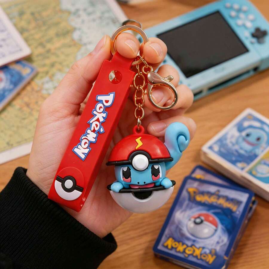 MINISO Pokemon Squirtle Poke Ball Keychain, Cute Character Mini Figure Bag Charm With Red Silicone Strap & Gold Tone Clip Hook, Backpack Purse Accessory, Back To School Gift - Blue - View 1