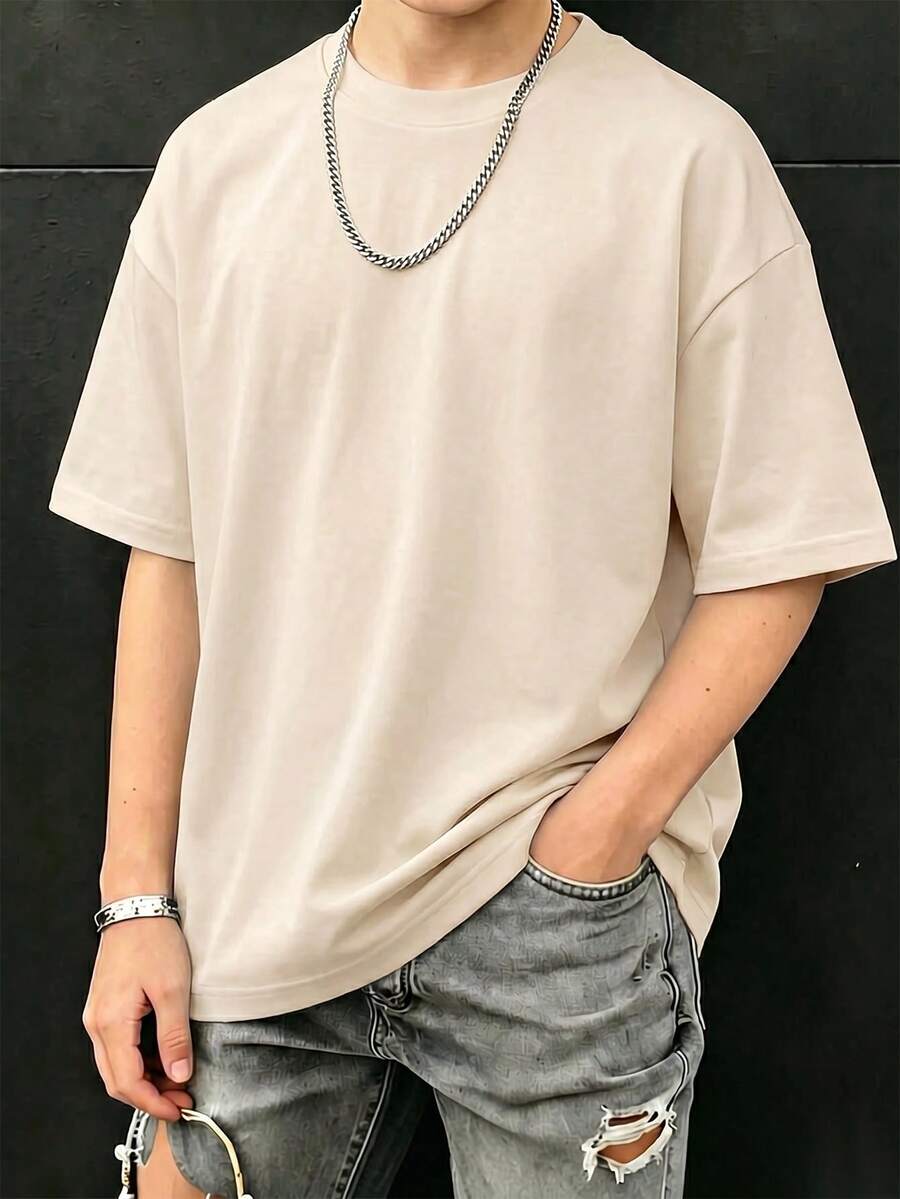 男童百搭白色短袖T恤,简约圆领宽松版型,柔软透气面料,适合男孩穿着,可用于上学、日常休闲等场合。 - 杏色 - 查看 1