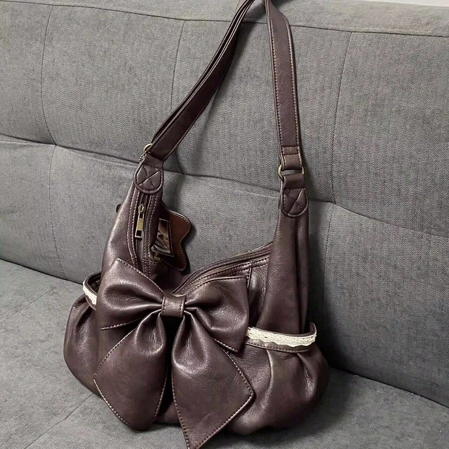 Sac fourre-tout vintage marron avec détail de nœud en dentelle délicat et ceinture à nouer, sac à main spacieux et élégant pour femme. Design léger dans un style rétro littéraire, peut être porté de manière flexible comme sac à bandoulière ou sac bandoulière. - Tabac - Voir 1