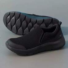 Skechers Men's Lightweight Cushioned Slip-On Casual Walking Shoes - Black - View 5