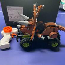 WPOXH B Dinosaur Toy Car That Can Be Remotely Operated. This All Terrain Off-Road Vehicle Is Equipped With A 2.4GHz Remote System, Decorative Components For Self-Assembled Off-Road Models, And An Ideal Gift For Assembling Toys - Brown Dinosaur Toy Car - View 2