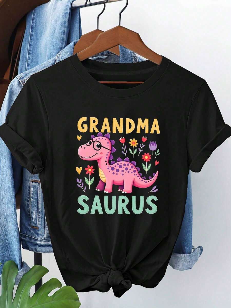 'Grandma Saurus' Graphic T-Shirt For Women - Cute Cartoon Dinosaur With Floral Details, Casual Short-Sleeved Black T-Shirt, Ideal For Spring-Summer, Gifts For Grandmothers. - 黑色 - 查看 1