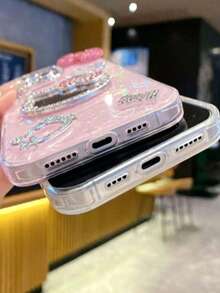 SANRIO 1pc Girls Fashion Creative Phone Case, Waterproof Anti-Drop Shockproof Material, Laser Color-Changing Heart, 3D Rhinestone KT Cat Head, Rhinestone Bow, Anime Style, Luxury Shiny, KT Cute Fashion, Suitable For Apple 17 Series 11/12/12pro, 13/14/15, 13pro/14pro/15pro 16promax, 17, 17pro, 17pro Max Phone Protective Case, Best Gift For Ramadan, Valentine's Day - Pink - View 2