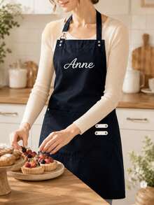 可客製化工裝風刺繡圍裙，支持個性化姓名刺繡，可調節金屬扣帶適合不同體型，大容量前口袋方便存放廚房用具與手機，耐污防油易清洗面料，適用於戶外燒烤、居家烹飪、餐廳工裝風，客製化風格具備強烈獨特性 - 黑色 - 查看 10