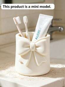 1pc Cream Style Bow Mini Toothbrush Cup, Cute Desktop Storage Box, Multi-Functional Toothbrush & Toothpaste Holder, Mini Vase Small Potted Plant Decor, Bathroom Vanity Desktop Organizer, Dorm Home Decor, Makeup Brush Holder - Multicolor - View 2