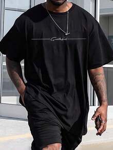 Manfinity Homme Camiseta casual de manga corta con cuello redondo y estampado, para uso diario, tallas grandes para hombre - Negro - Ver 1