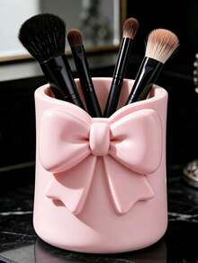 Mini Cream-Colored Bow-Shaped Creative Toothbrush Holder, Can Be Used As A Toothbrush Cup Or Desktop Storage Organizer. It Can Hold Toothbrushes, Toothpaste And Other Items. At The Same Time, It Can Also Be Used As A Flower Pot Or Vase To Add Decorative Effect To The Vanity, Making It An Ideal Choice Among Bathroom Supplies. Perfect For Creating A Warm Home Bathroom Atmosphere, And Also An Ideal Choice For Autumn Decor And Back To School Season. - Multicolor - View 6