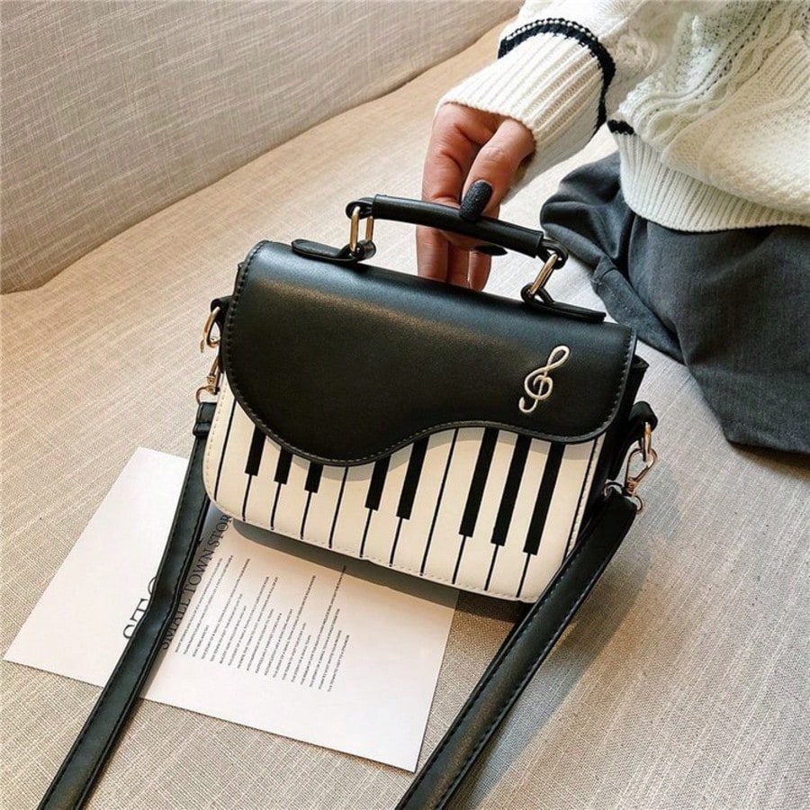 Borsa quadrata con patta a motivo tasti di pianoforte Hevel Mini, borsa a tracolla con note musicali di pianoforte e chitarra, materiale PU creativo,