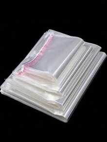 100pcs Clear Self-Seal OPP Bags/Gift Packaging Set - 2-13" S/M/L/XL, Self-Adhesive Dustproof Reusable For Gifts, Weddings, Birthdays, Jewelry, Candy, Toys, Clothes, DIY, Travel, Mailing - Ideal For Halloween, Christmas, Valentine's, Family Gatherings - Multiple Styles - View 1