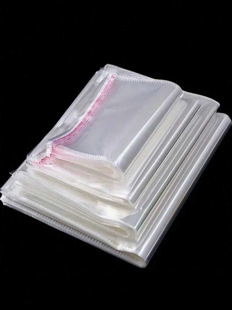 100pcs Clear Self-Seal OPP Bags/Gift Packaging Set - 2-13" S/M/L/XL, Self-Adhesive Dustproof Reusable For Gifts, Weddings, Birthdays, Jewelry, Candy, Toys, Clothes, DIY, Travel, Mailing - Ideal For Halloween, Christmas, Valentine's, Family Gatherings - Multiple Styles - View 1