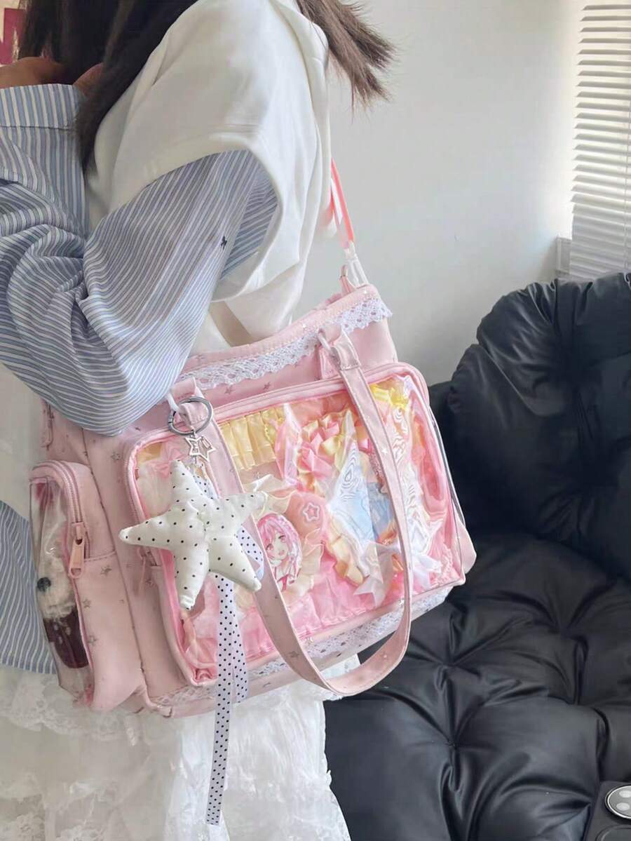 1件日系軟妹清新百搭女款單肩包，高品質尼龍材質搭配滿版星星印花，蕾絲飾邊增添優雅細節，2D JK 動漫展 DIY 透明裝飾包，雙側口袋附透明層，大容量休閒托特包，適合學生攜帶書籍上課，可愛甜美風格女包，防水尼龍面料，可用於展示動漫周邊、參加漫畫展、購物、派對與旅行的 Ita Bag