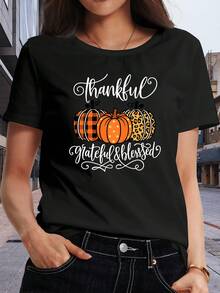 Ladies' T-Shirts Made from Breathable And Soft Medium-Stretch Material, Featuring a Regular Length. These Casual Short-Sleeve Tops Showcase a Cartoon Pumpkin Art Font Print Design, Making Th - Negro - Ver 2