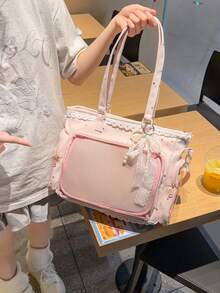 1件日系軟妹清新百搭女款單肩包，高品質尼龍材質搭配滿版星星印花，蕾絲飾邊增添優雅細節，2D JK 動漫展 DIY 透明裝飾包，雙側口袋附透明層，大容量休閒托特包，適合學生攜帶書籍上課，可愛甜美風格女包，防水尼龍面料，可用於展示動漫周邊、參加漫畫展、購物、派對與旅行的 Ita Bag - 粉色 - 查看 7