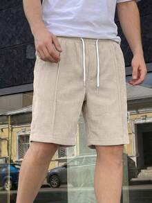 1件青少年男孩復古燈芯絨寬鬆寬腿休閒短褲，側面字母裝飾，簡約直筒中長褲 - 卡其色 - 查看 1