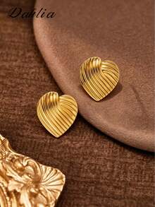A Pair Of Gold Heart-Striped Earrings, Made Of Stainless Steel. The Elegant Heart-Striped Design Makes These Hypoallergenic Stainless Steel Earrings A Perfect Gift For A Female Friend, Ideal For A Teacher Or Other Female Jewelry Enthusiast. - Gold - View 4