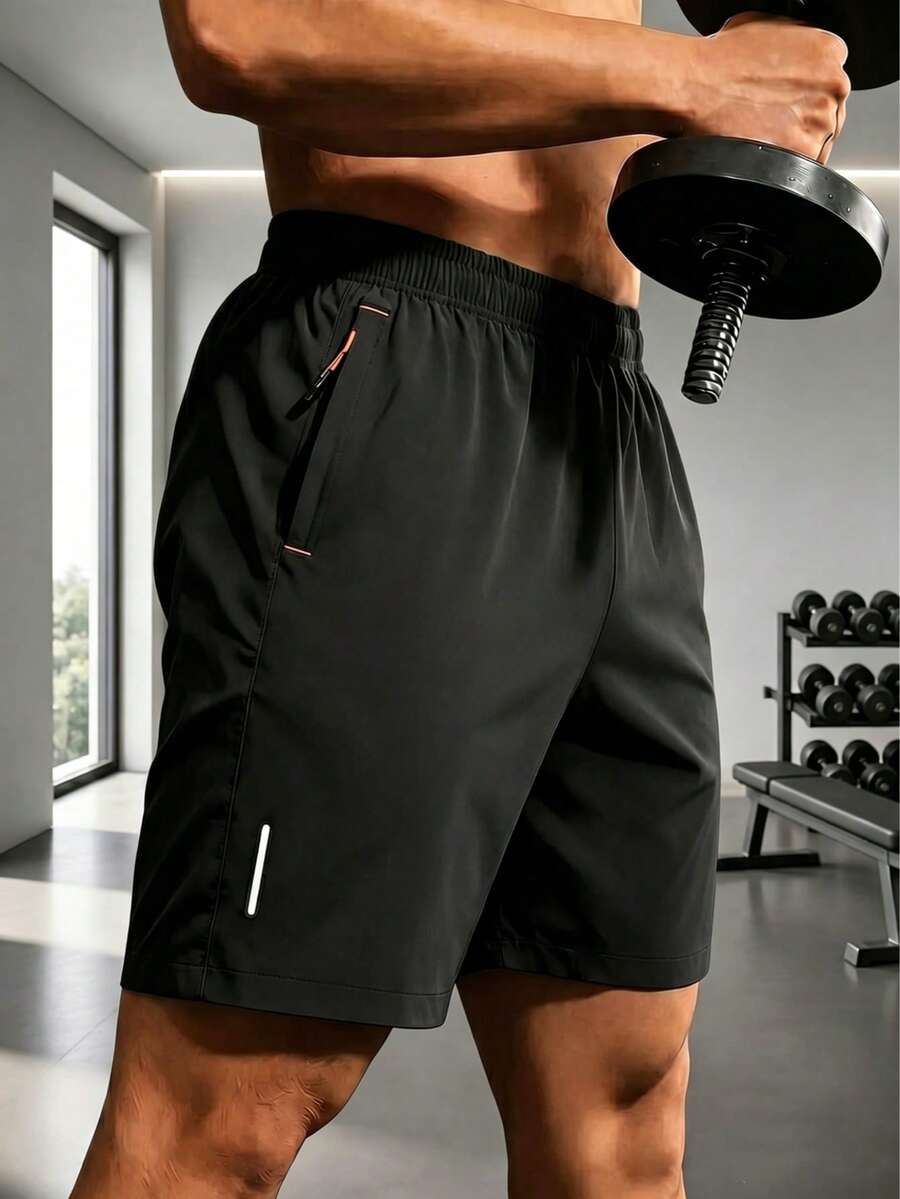 Pantalones cortos deportivos casuales holgados de alto rendimiento para hombre, de secado rápido, unicolor, con diseño de franja reflectante, bolsillos, cremallera y cordón de cintura - Negro - Ver 1