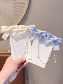 2 pezzi Fermagli per capelli con fiocco in raso, bastoncini per capelli con fiocco e nappe a catena di perle, accessori decorativi alla moda per capelli da ragazza - Multicolore - Visualizzare 3
