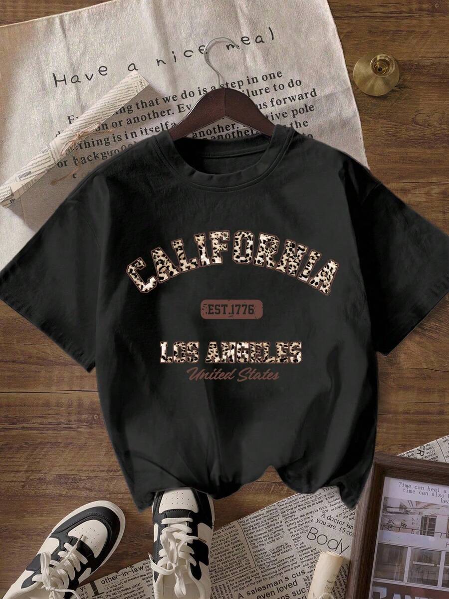 Camiseta de manga corta de cuello redondo con estampado de leopardo y gráfico de letras, casual de verano para mujer - Negro - Ver 1